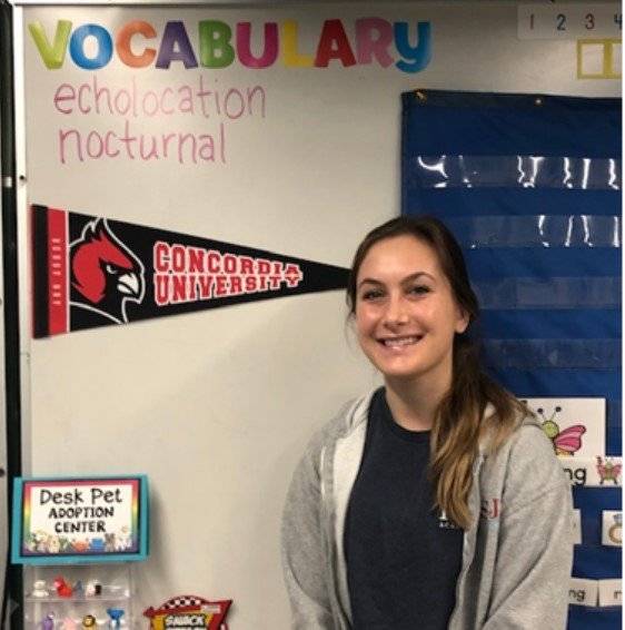 Amber Streeter shows her Cardinal pride as an elementary teacher in Michigan. 