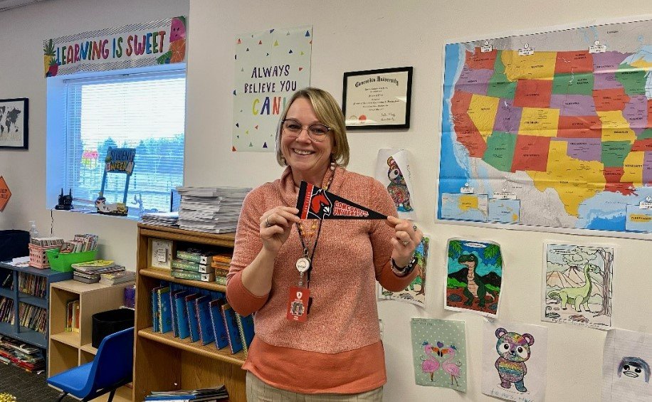 Angela Kline  shows her Cardinal pride as a third grade teacher in Michigan.