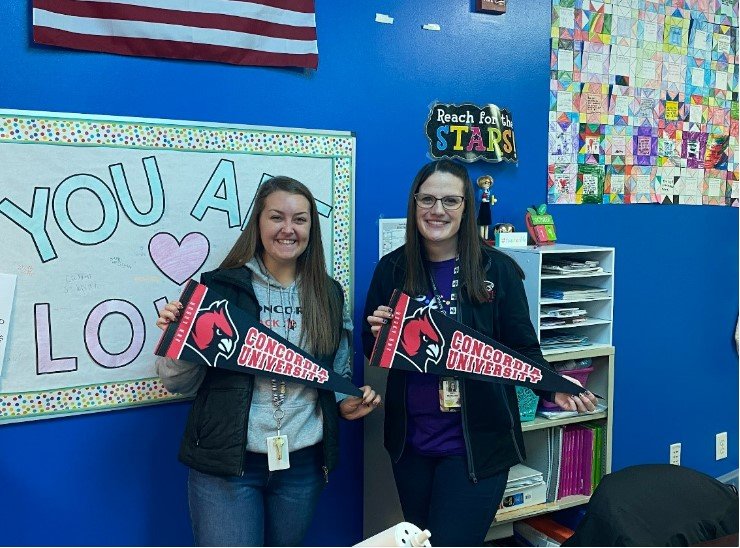 Payton Lovins and Becky McCracken shows their Cardinal pride