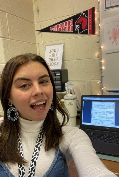 Breanna Sheridan shows her Cardinal pride as a teacher at Trinity Lutheran in Utica.