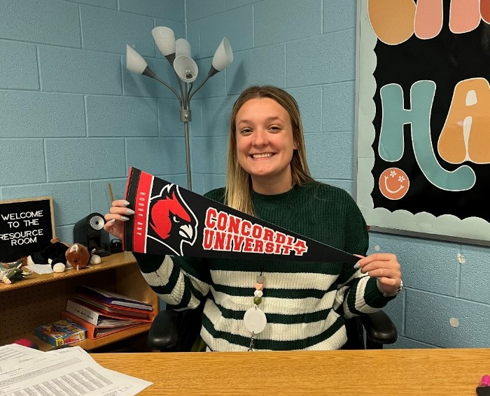 Molly Pummill shows her Cardinal pride as a special education teacher in Michigan.