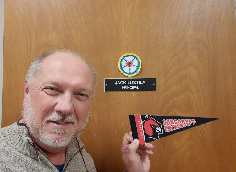 Jack Lustila shows his Cardinal pride as principal of Trinity Lutheran in Sturgis, MI.