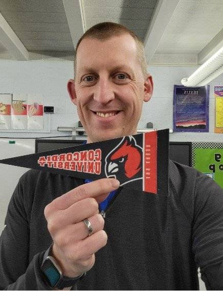 James Ullman shows his Cardinal pride as a first grade teacher in Iowa. 