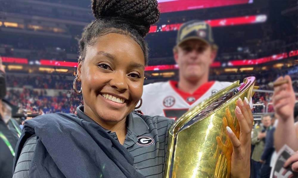 J'may Simmons with championship trophy