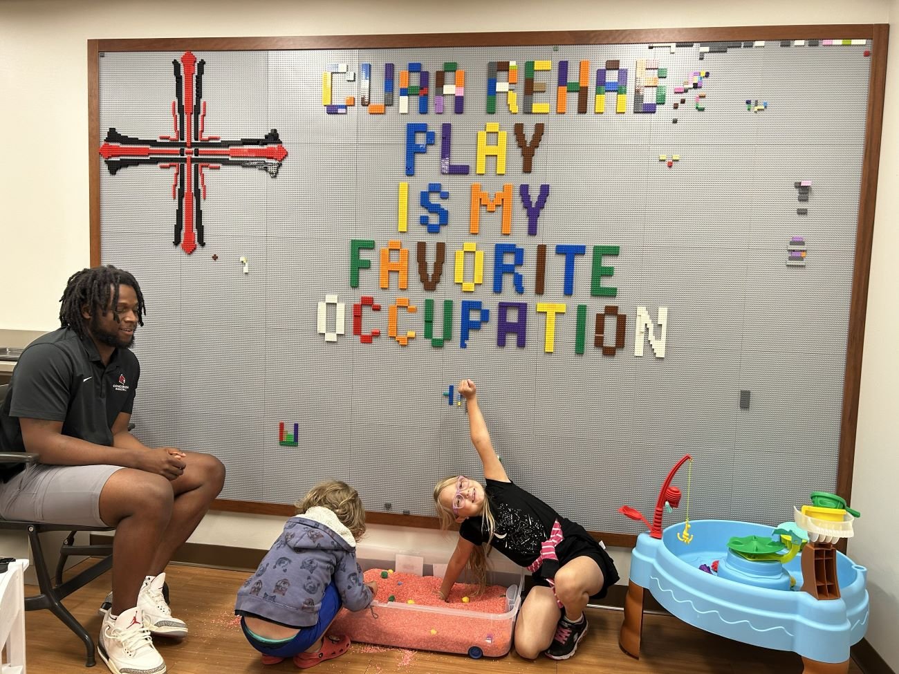classroom with kids and adult