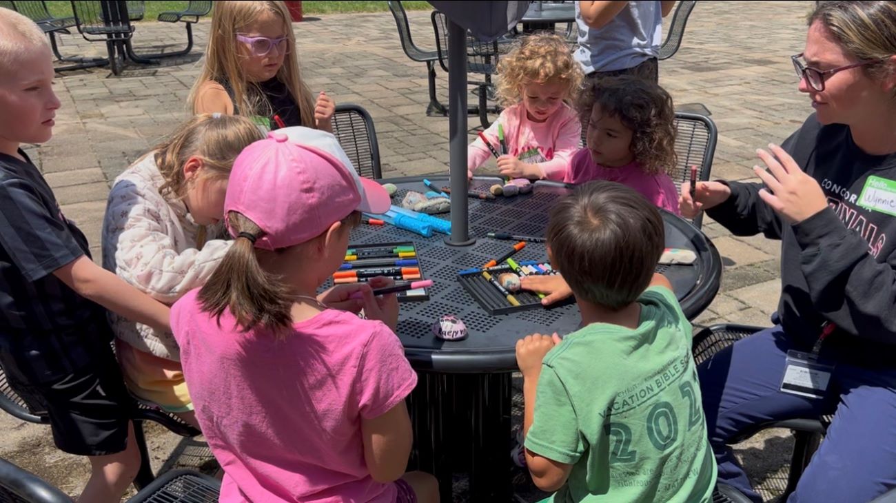 kids drawing at table