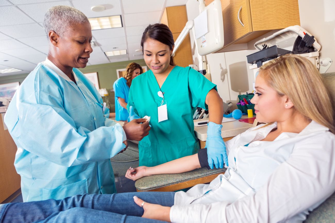 three women in a hospital setting