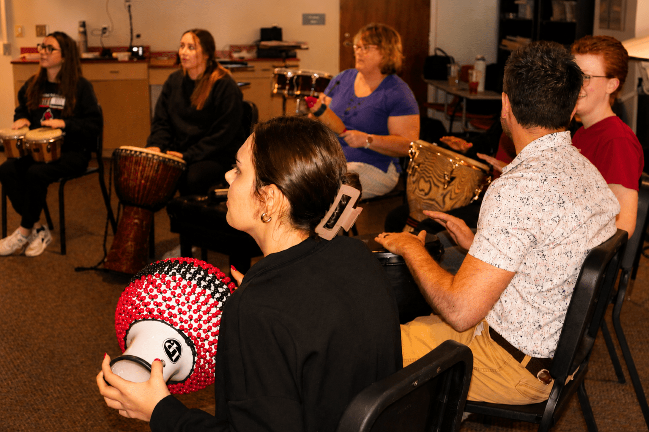 OT students in drum circle