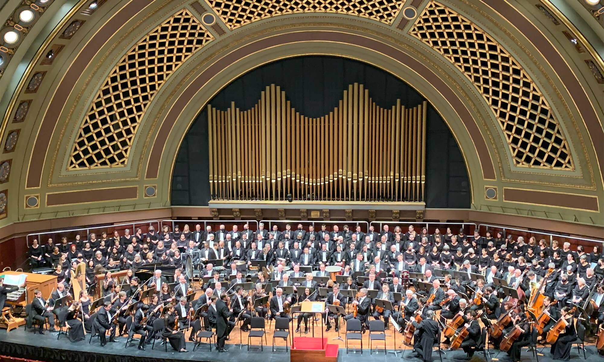 The University Musical Society Choral Union on stage at Hill Auditorium in Ann Arbor with the BRNO Philharmonic Orchestra.